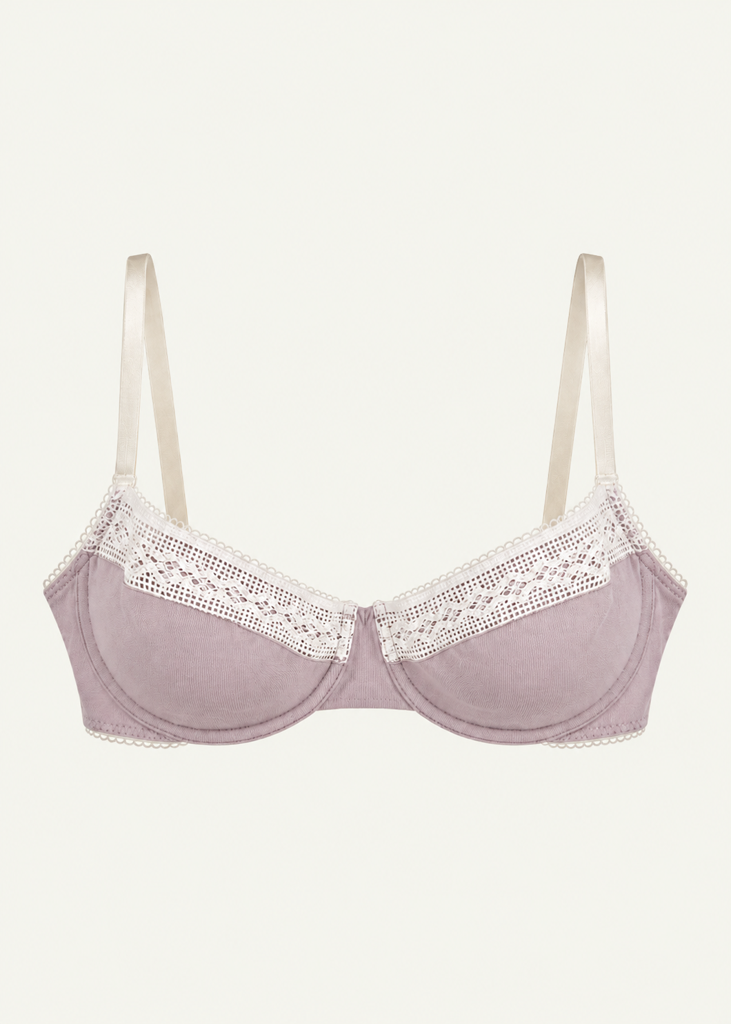 Front product view of the Lilac Charlotte Bra by Lunetti against an ivory background, featuring soft lilac bamboo jersey cups, delicate white lace trim, supportive underwire construction, and adjustable ivory shoulder straps.