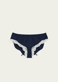 Midnight Navy Luna Brief by Lunetti against an ivory background, featuring soft stretch fabric, a comfortable waistband, and delicate ivory floral lace trim along the leg openings.