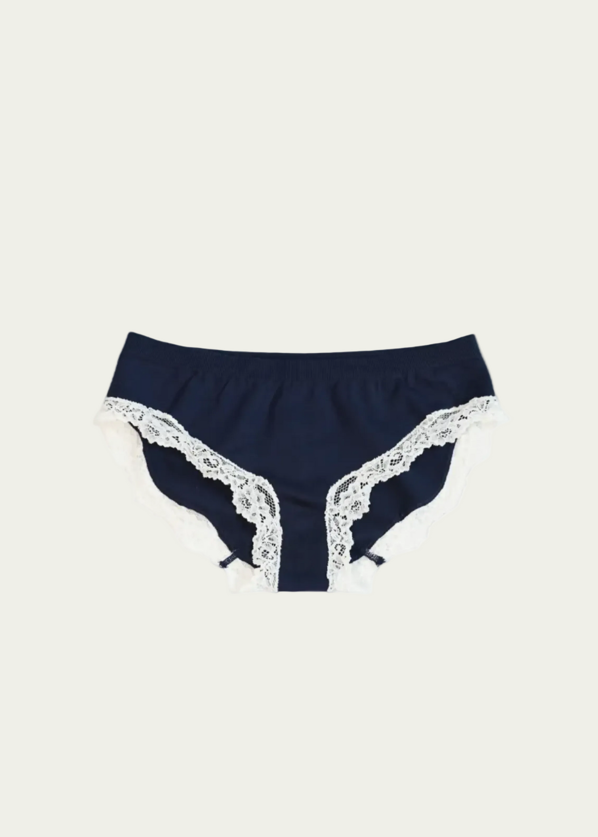 Midnight Navy Luna Brief by Lunetti against an ivory background, featuring soft stretch fabric, a comfortable waistband, and delicate ivory floral lace trim along the leg openings.