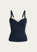 Midnight Navy Luna Cami by Lunetti against an ivory background, featuring soft sculpting fabric, adjustable shoulder straps, and delicate ivory lace trim along the V-neckline.
