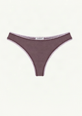 Front product view of the Orchid Margot Thong by Lunetti against an ivory background, featuring muted purple bamboo jersey, contrasting lilac picot trim along the waistband and leg openings, decorative zigzag stitching, and a centered Lunetti label.