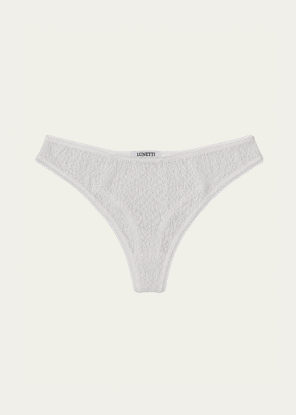 White textured lace thong underwear with a small black 'Lunetti' brand label on the front waistband, shown against a solid off-white background.